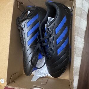 Adidas Kids cleats in Black and Blue